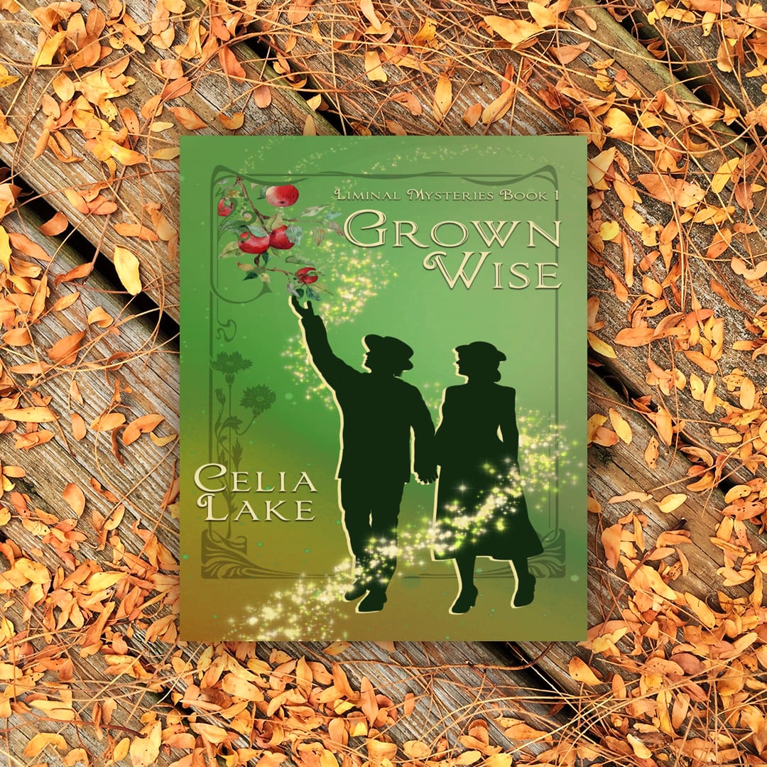 Cover of Grown Wise: A silhouetted man and woman in 1940s clothes, walking together as he reaches for a branch full of apples. The background is a muted green and brown, scattered with a swoosh of golden light. It is resting on a wooden table covered with fallen small leaves.