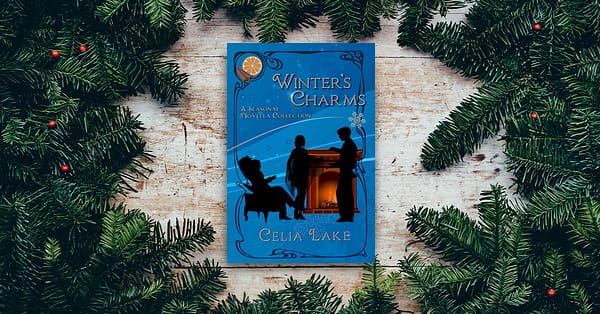 A copy of Winter's Charms, sitting on a wooden table with evergreen boughs and red berries surrounding it. The cover has three people (two standing, one sitting) around a hearthfire with seasonal decorations.